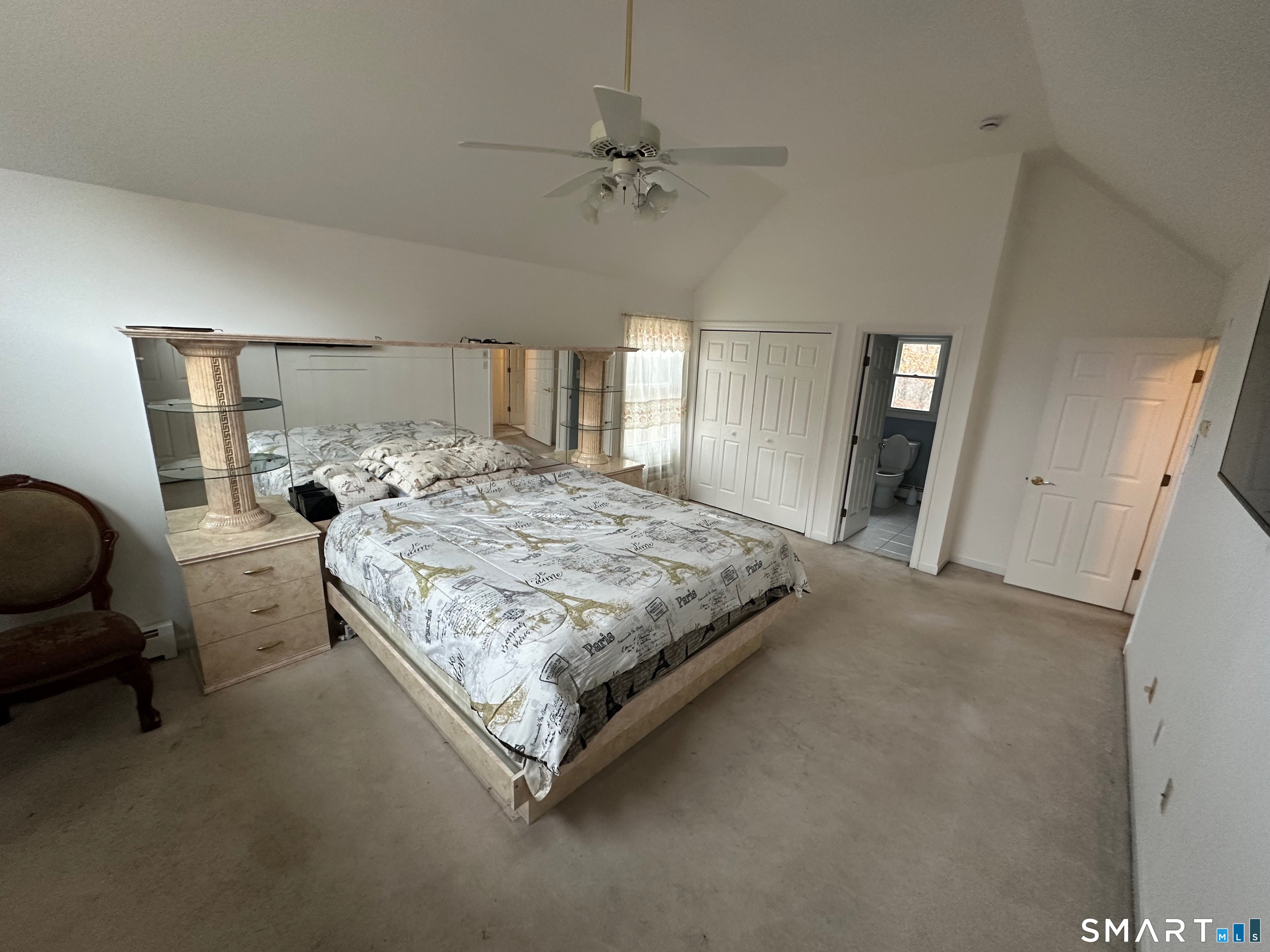 120 Tyler Way Bristol, CT 06010 - Photo 19 of 40 a bedroom with a bed window and a table