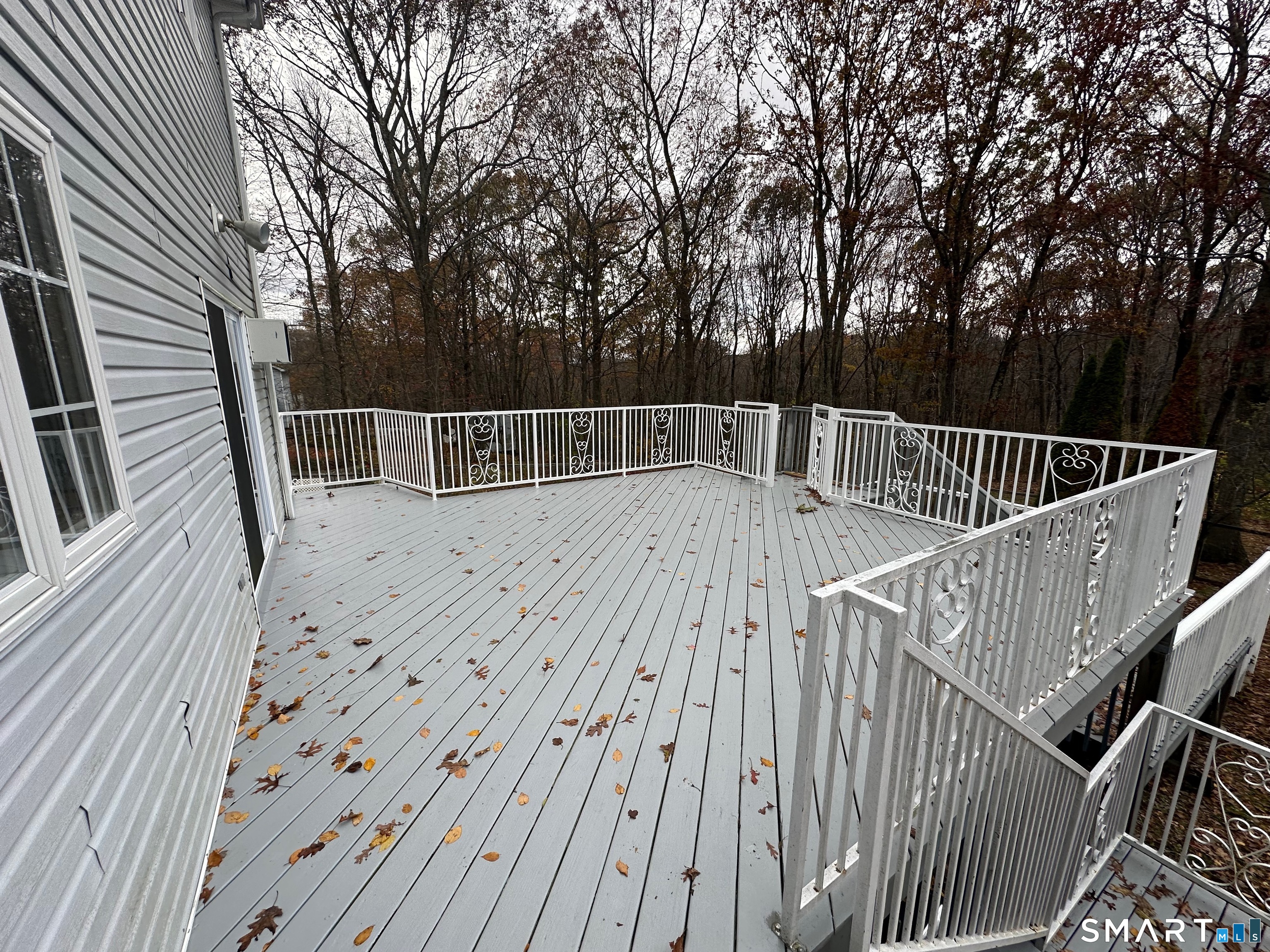 120 Tyler Way Bristol, CT 06010 - Photo 29 of 40 a view of backyard with deck and trees