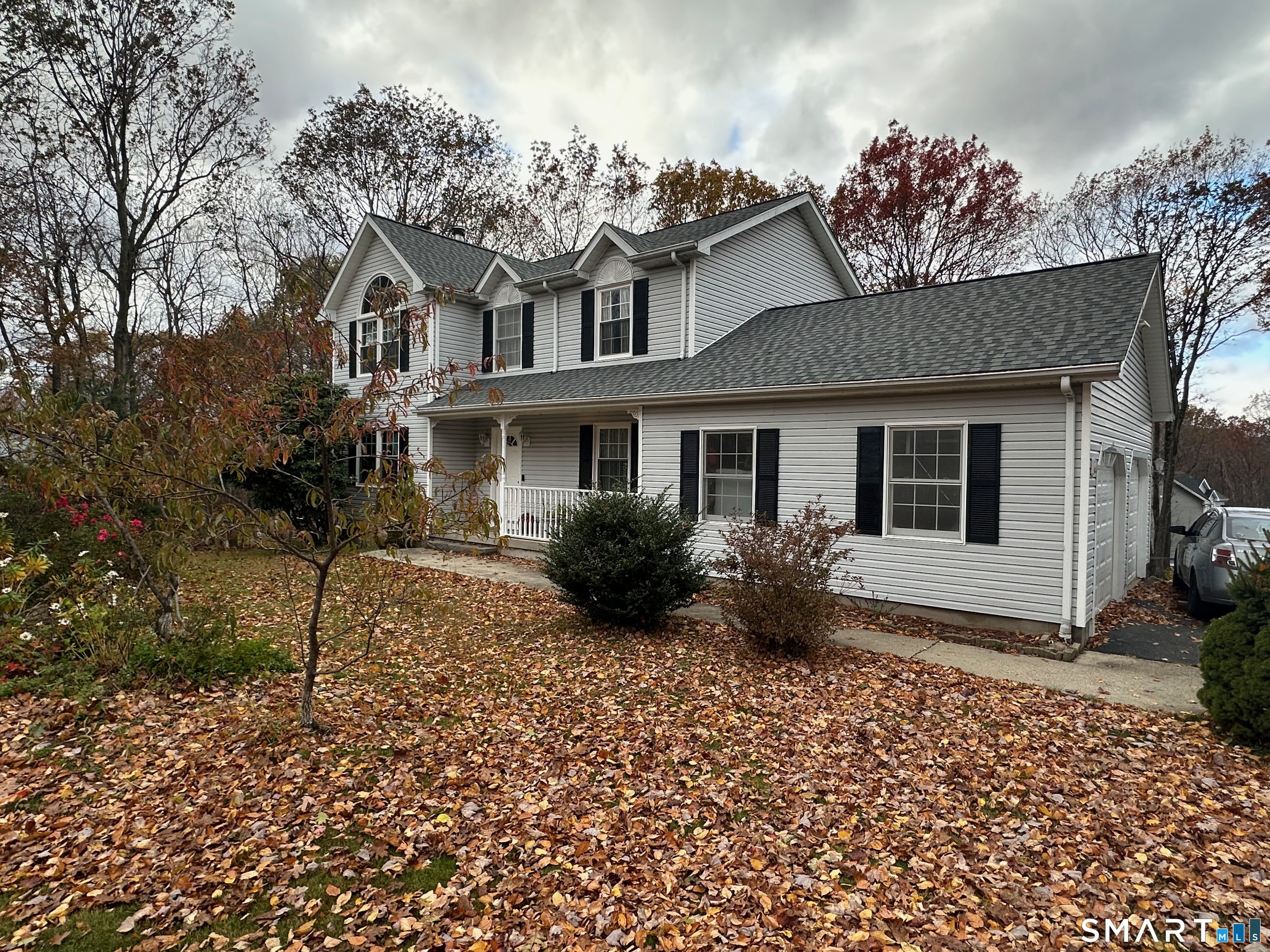 120 Tyler Way Bristol, CT 06010 - Photo 3 of 40 a view of a house with a garden