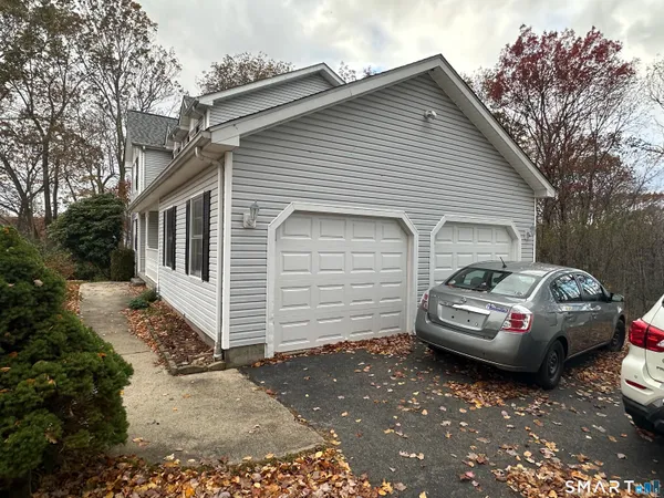a car parked in front of a house