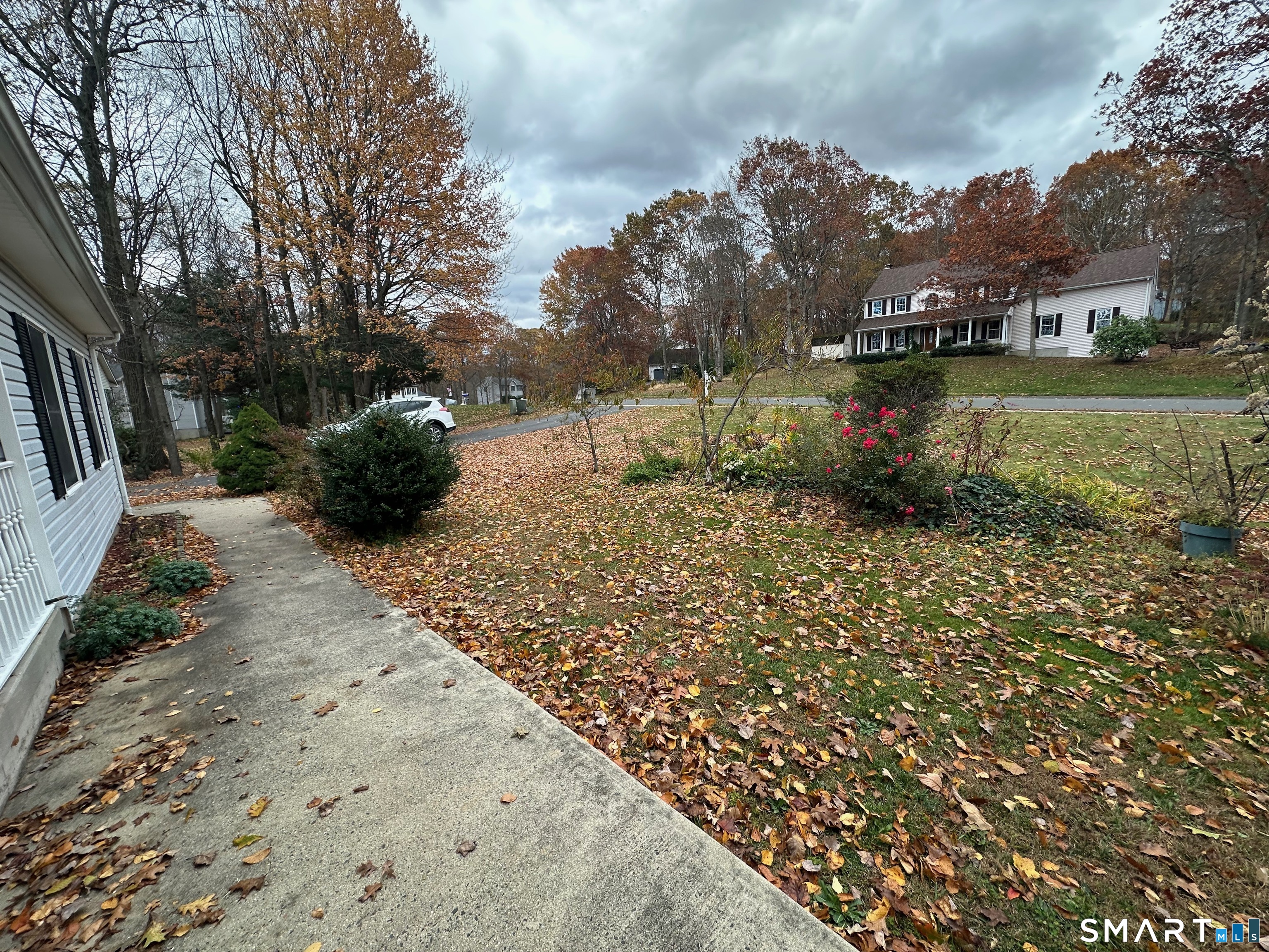 120 Tyler Way Bristol, CT 06010 - Photo 5 of 40 a backyard of a house with lots of green space