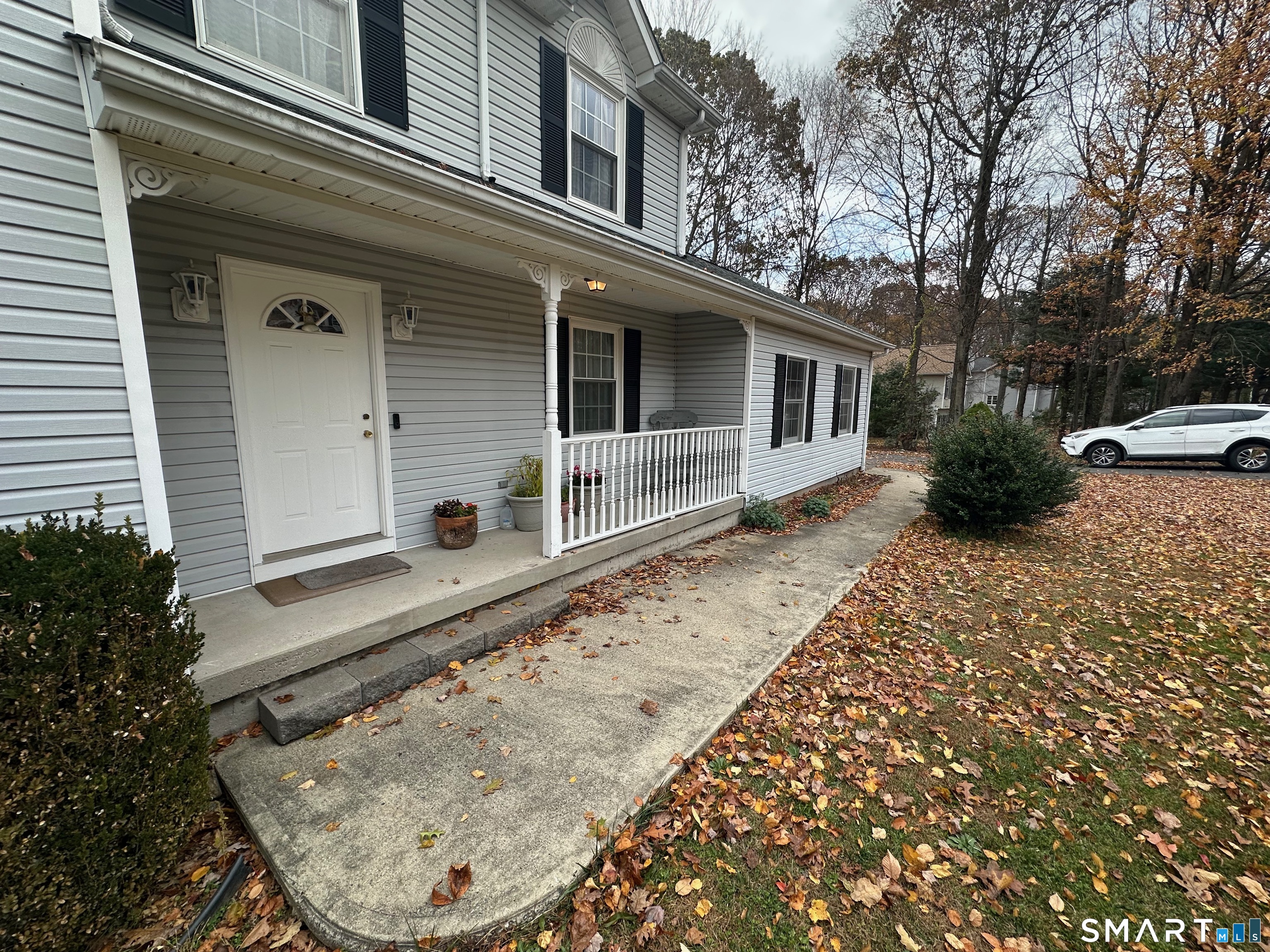 120 Tyler Way Bristol, CT 06010 - Photo 6 of 40 front view of a house with a yard