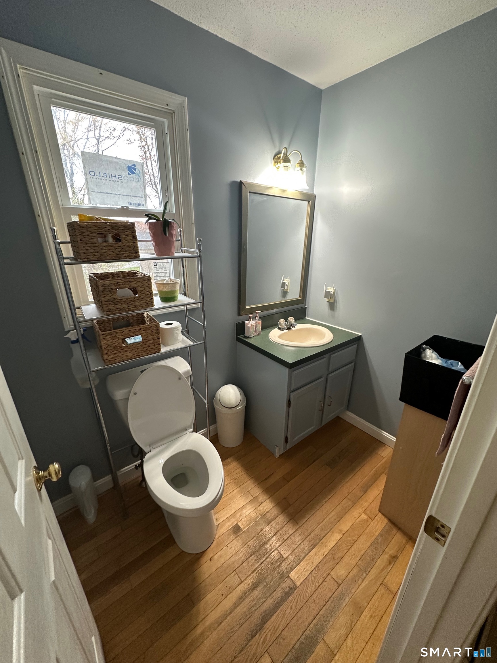 120 Tyler Way Bristol, CT 06010 - Photo 10 of 40 a bathroom with a toilet a sink and mirror