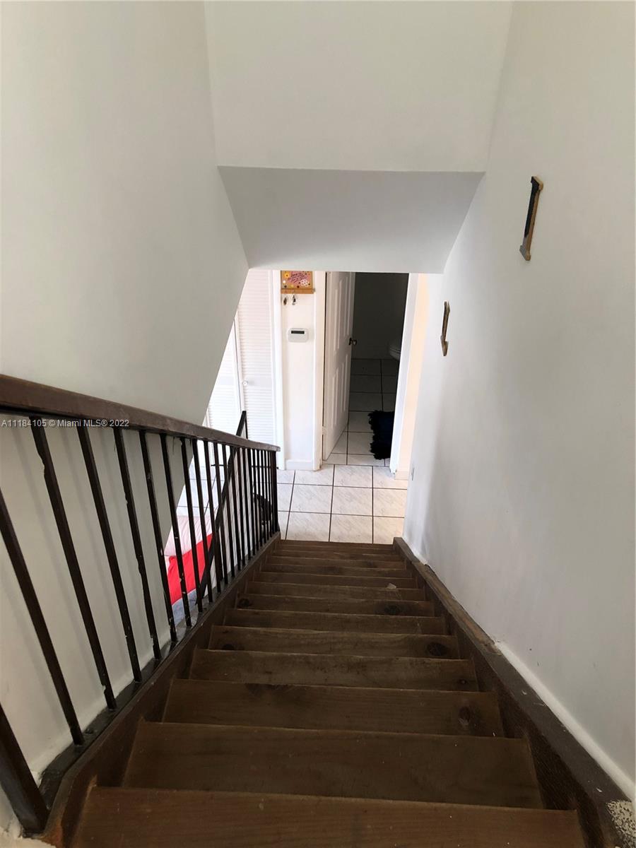 Kendall Miami, FL 33173 - Photo 16 of 26 a view of staircase with rug floor