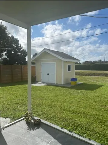 a house view with a outdoor space