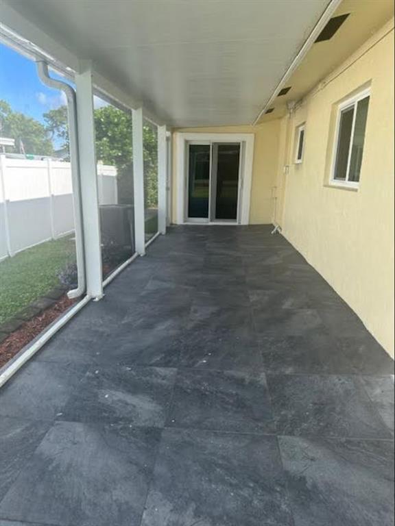 15109 Jackson Road Delray Beach, FL 33484 - Photo 13 of 14 a view of an empty room with windows