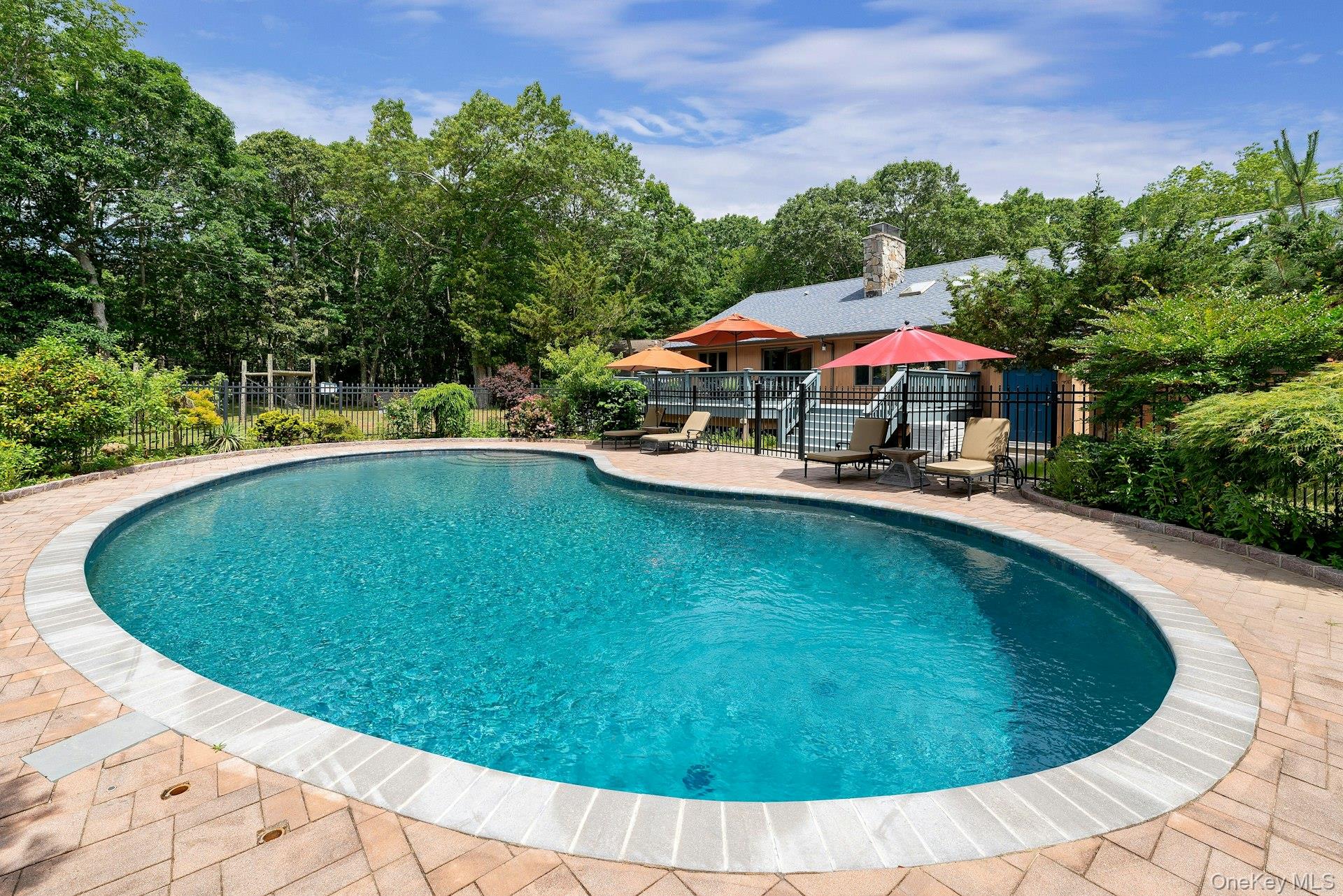 2905 Private Road East Marion, NY 11939 - Photo 30 of 33 View of pool featuring a patio area and view of scattered trees