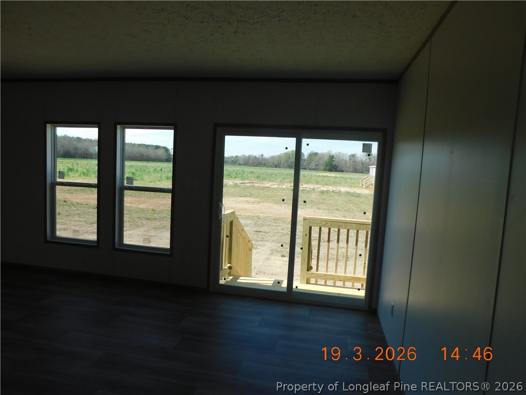 763 Opal Road Red Springs, NC 28377 - Photo 12 of 20 Living Room / Patio Doors to Deck