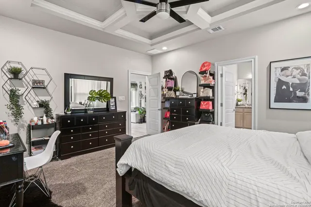 a bed room with a bed and a television