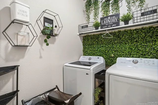 a utility room with dryer and washer