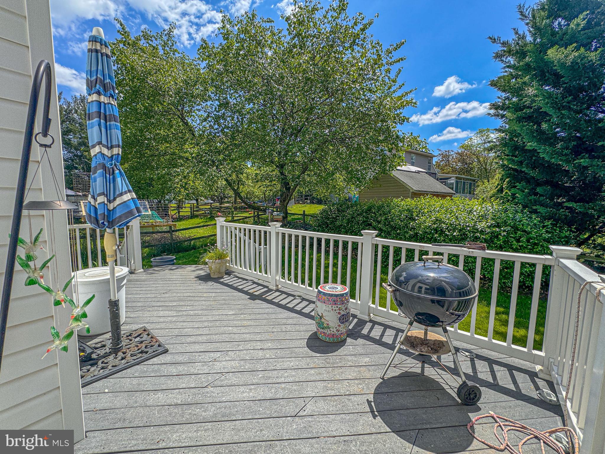 1724 Algonquin Road Frederick, MD 21701 - Photo 13 of 55 a view of balcony with wooden floor and outdoor seating