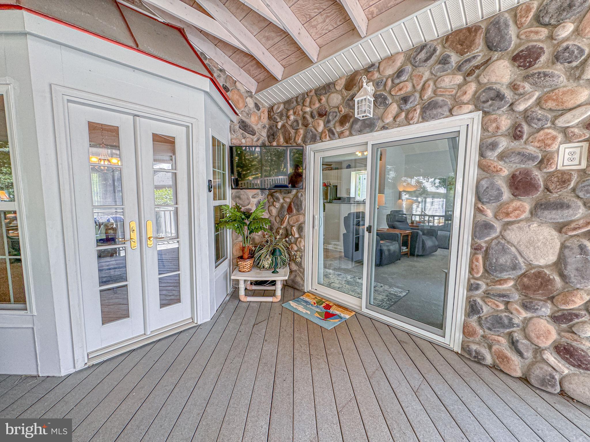 1724 Algonquin Road Frederick, MD 21701 - Photo 14 of 55 a porch with wooden floor