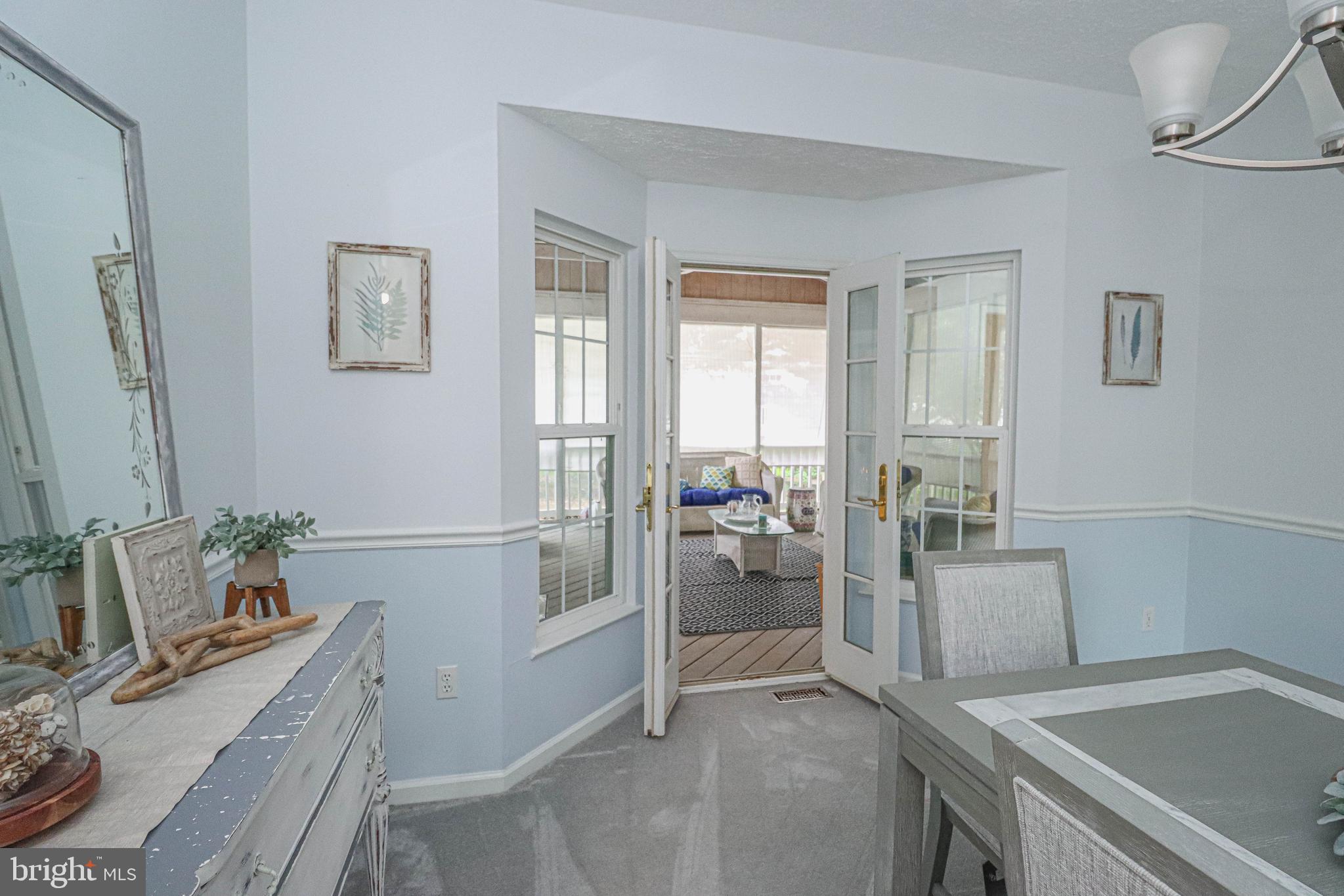 1724 Algonquin Road Frederick, MD 21701 - Photo 18 of 55 a room with a couch and a stove top oven