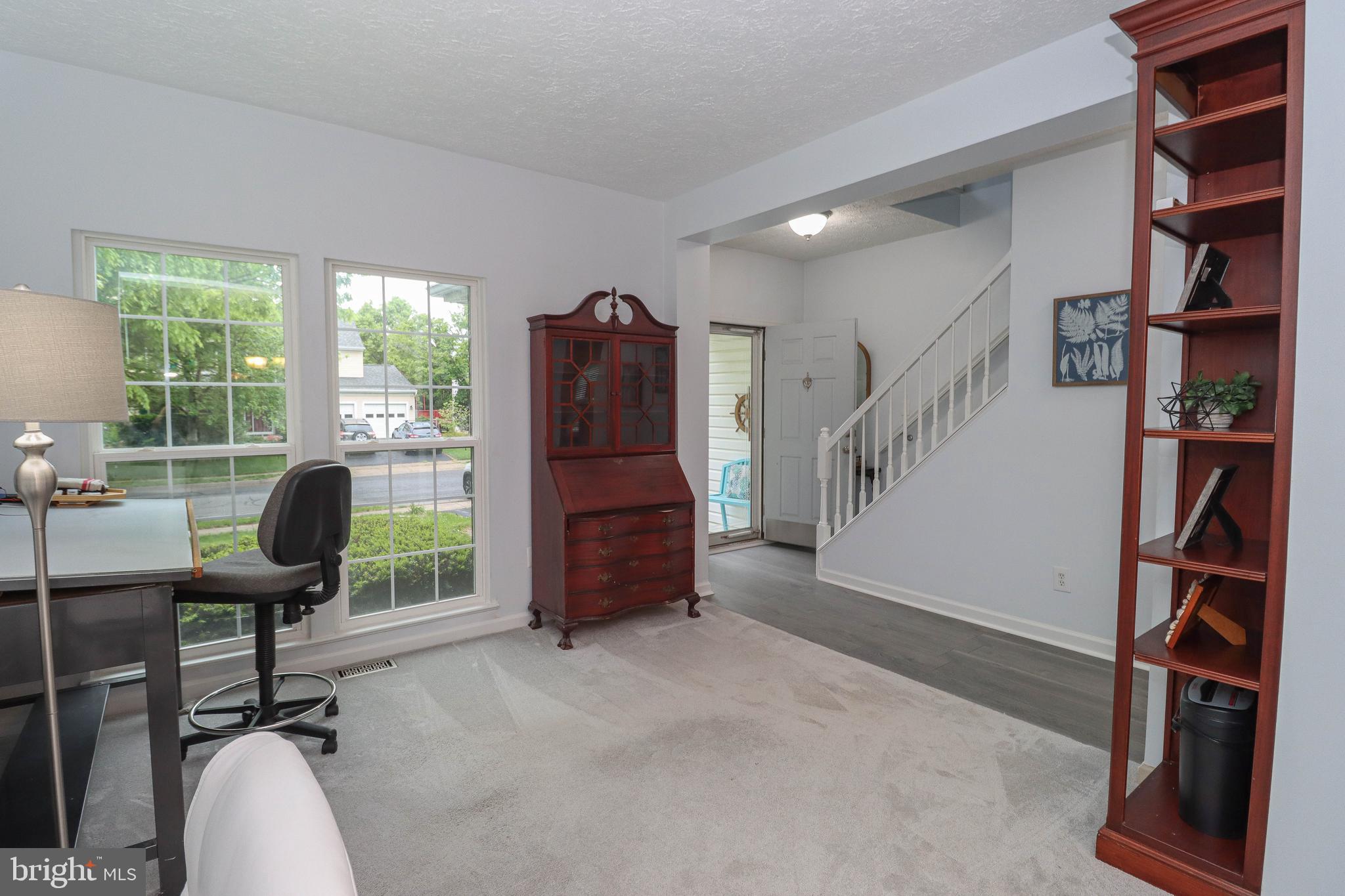 1724 Algonquin Road Frederick, MD 21701 - Photo 20 of 55 a workspace with furniture staircase and a window
