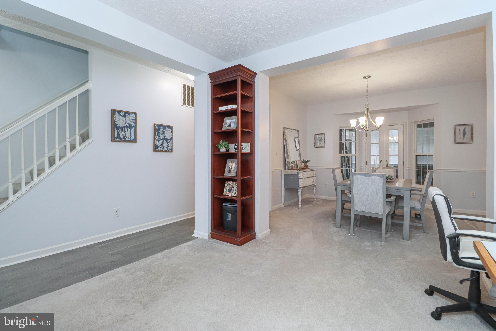 1724 Algonquin Road Frederick, MD 21701 - Photo 22 of 55 a view of a livingroom with furniture and a bookshelf