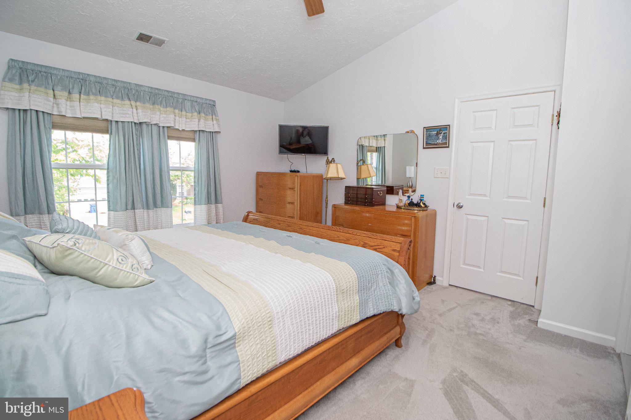 1724 Algonquin Road Frederick, MD 21701 - Photo 28 of 55 a bedroom with bed tv and window