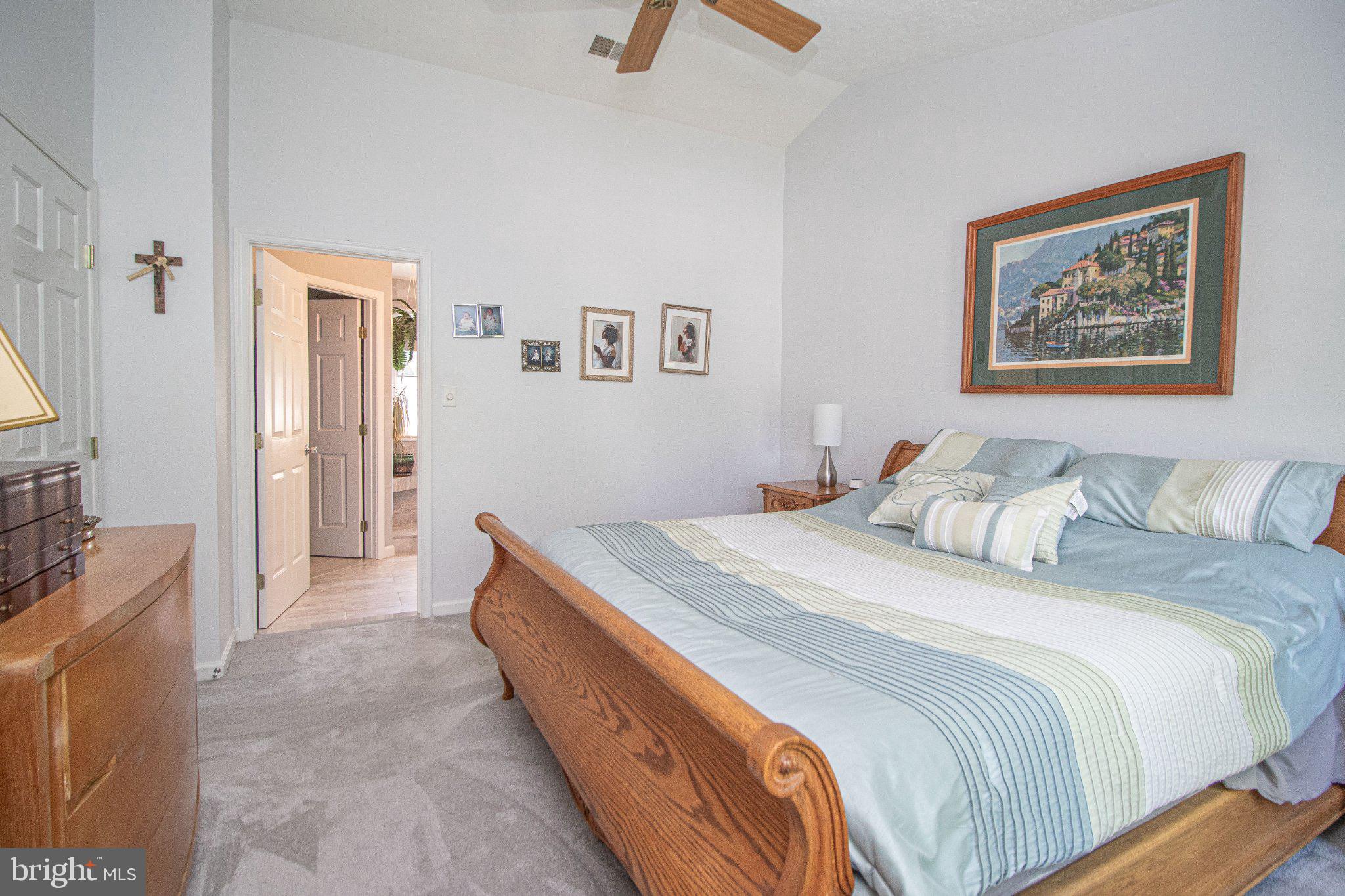 1724 Algonquin Road Frederick, MD 21701 - Photo 29 of 55 a bedroom with bed and painting on the wall