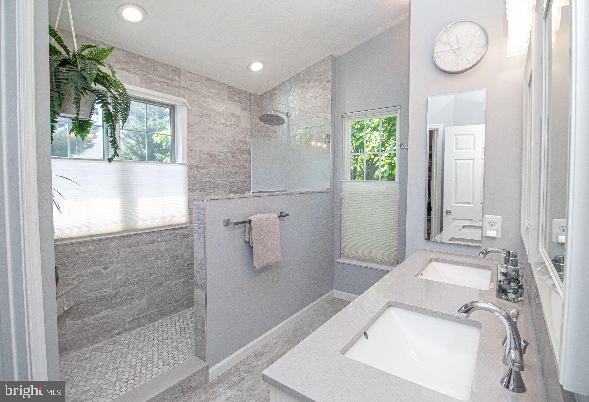 1724 Algonquin Road Frederick, MD 21701 - Photo 30 of 55 a bathroom with a sink a window and a shower