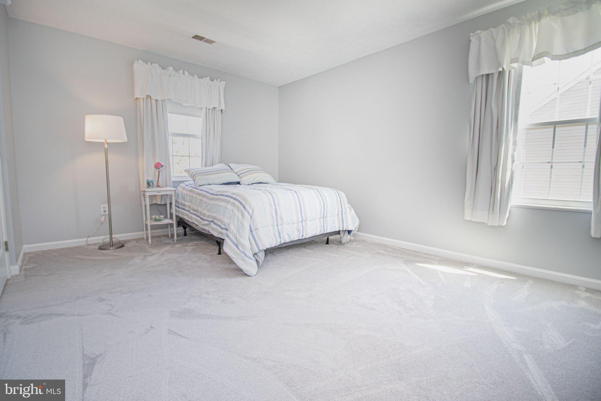 1724 Algonquin Road Frederick, MD 21701 - Photo 39 of 55 a bed sitting in a room next to a window