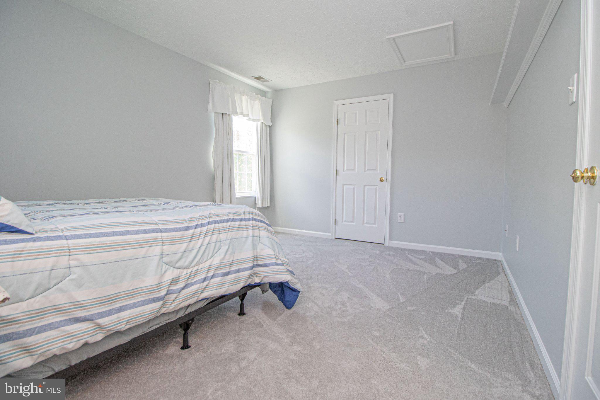 1724 Algonquin Road Frederick, MD 21701 - Photo 40 of 55 a bedroom with a bed and a window