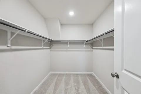 a bathroom with a sink a toilet and vanity