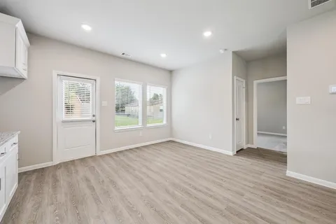 a bathroom with 2 sink and a mirror