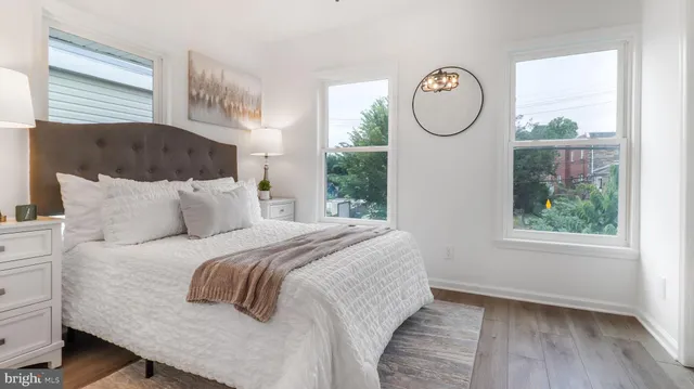 a bedroom with a bed and a cabinets