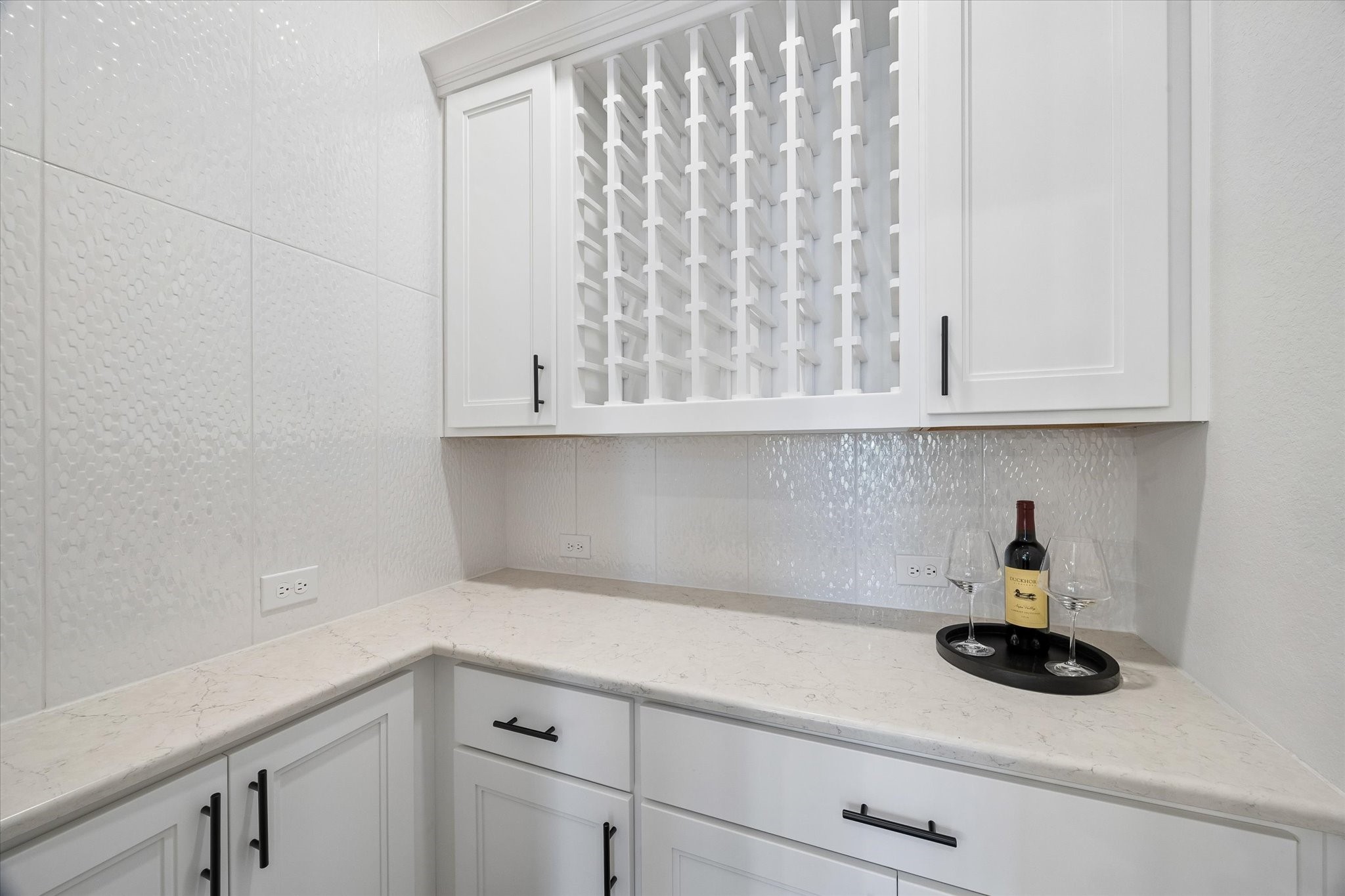 27720 Hazelbrook Lane Spring, TX 77386 - Photo 7 of 48 Your Wine Room is located right off of the Dining Room and includes built-ins, cabinets and a good amount of counter space. Perfect for storage and entertaining