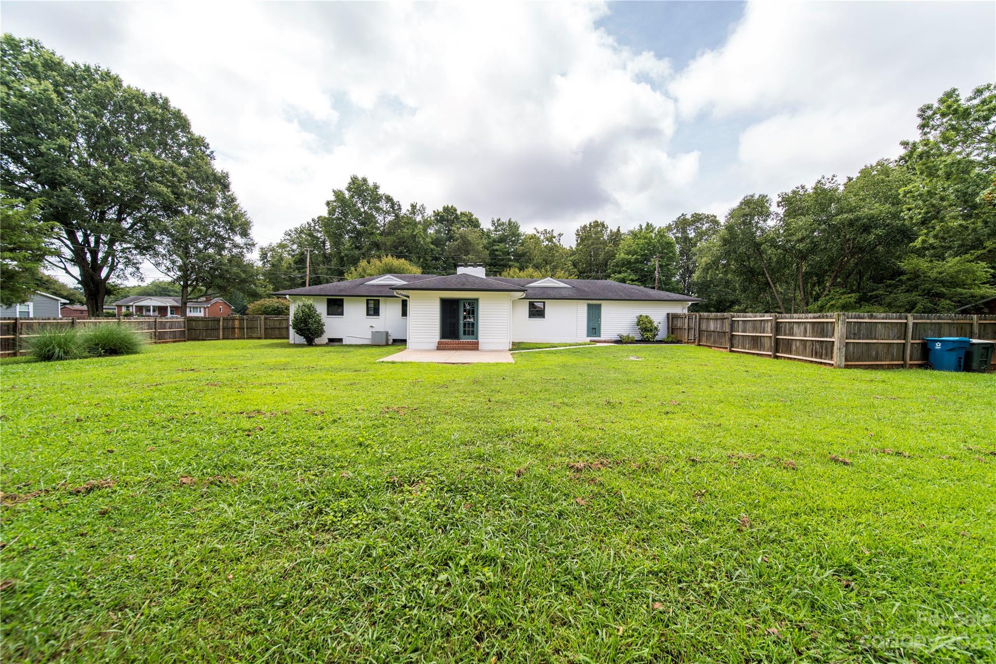 1253 Rainbow Road Advance, NC 27006 - Photo 18 of 46 a house view with a garden space