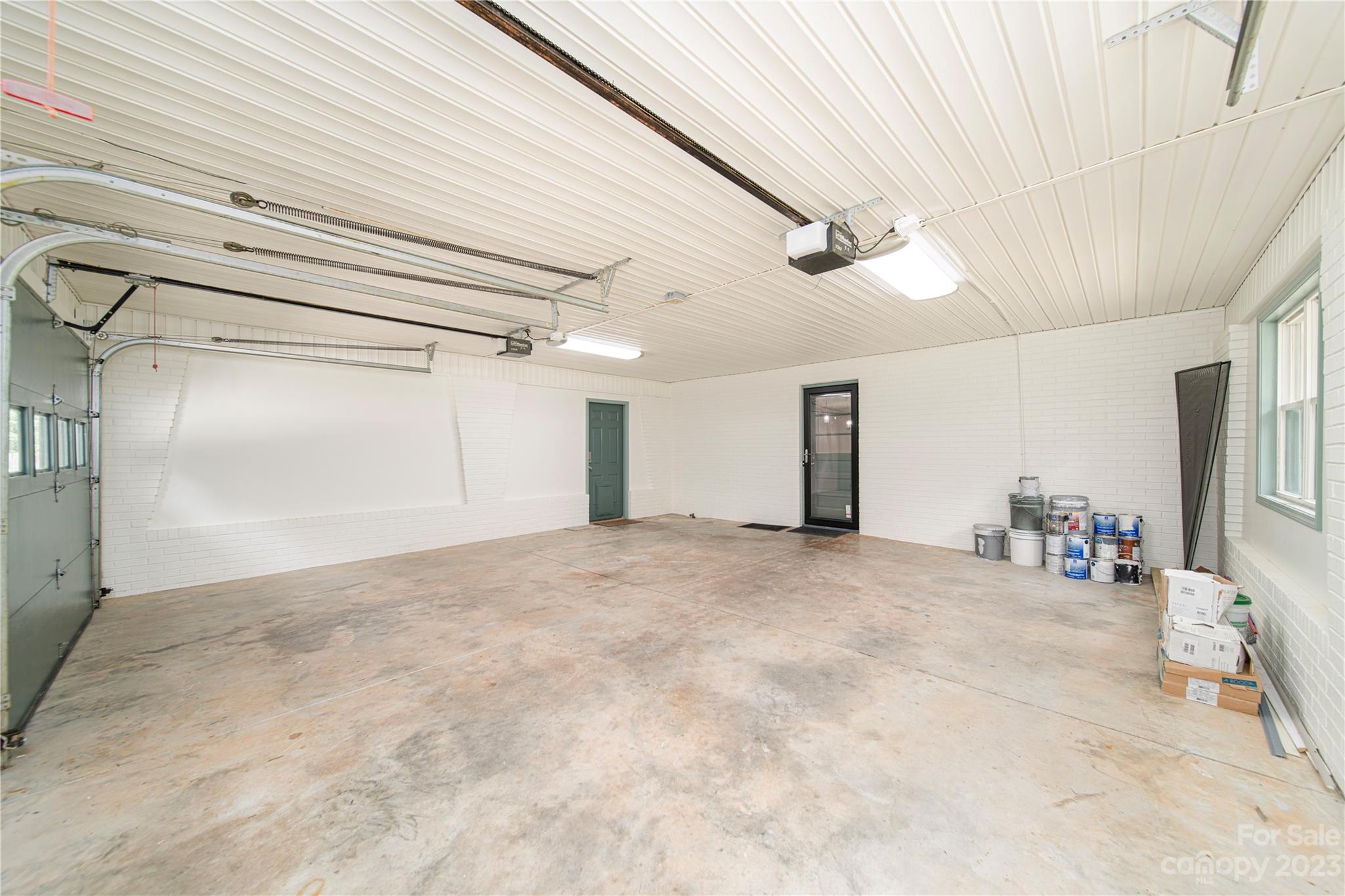 1253 Rainbow Road Advance, NC 27006 - Photo 22 of 46 a view of a livingroom with a ceiling fan