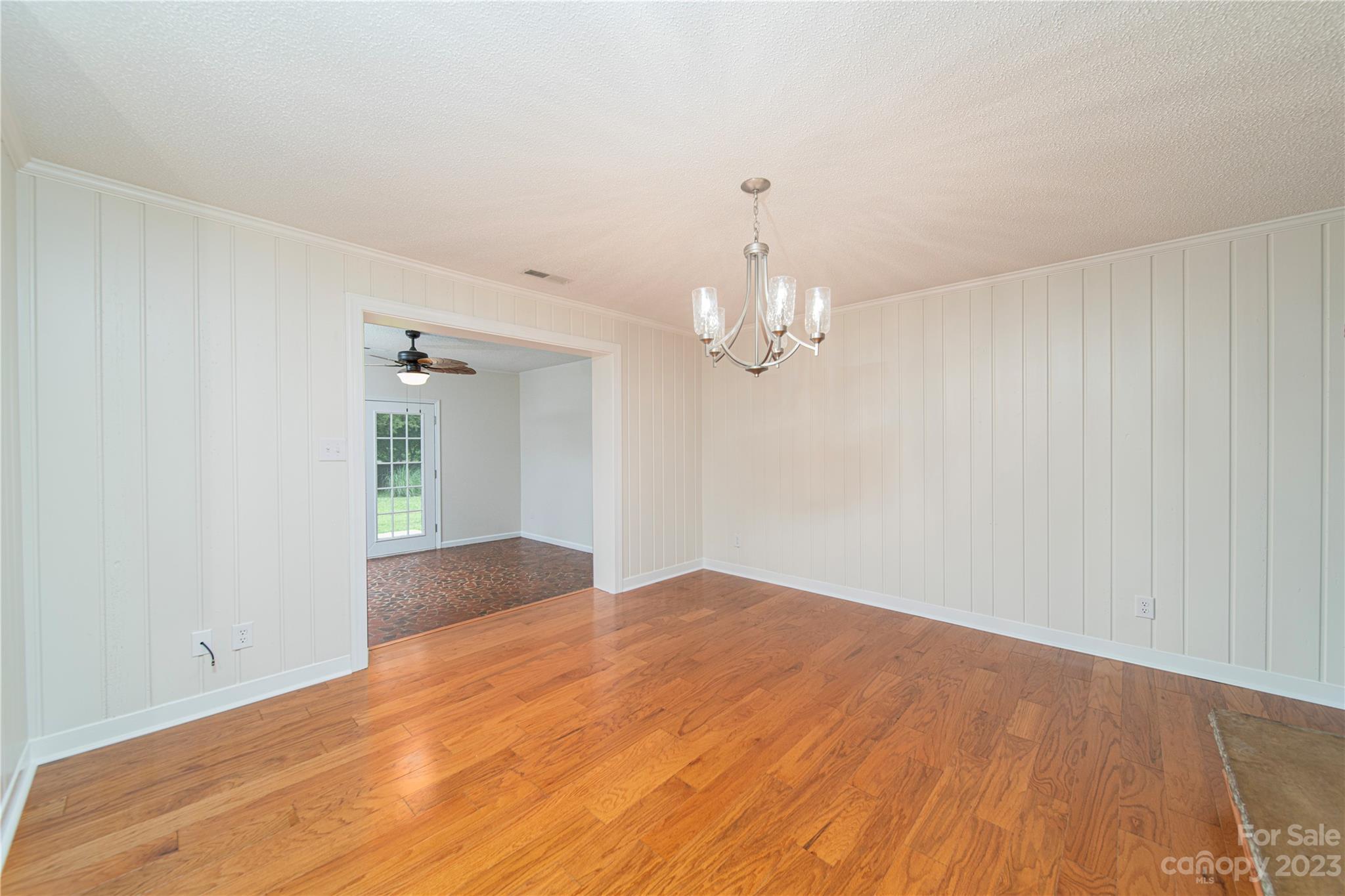 1253 Rainbow Road Advance, NC 27006 - Photo 25 of 46 a view of empty room with wooden floor