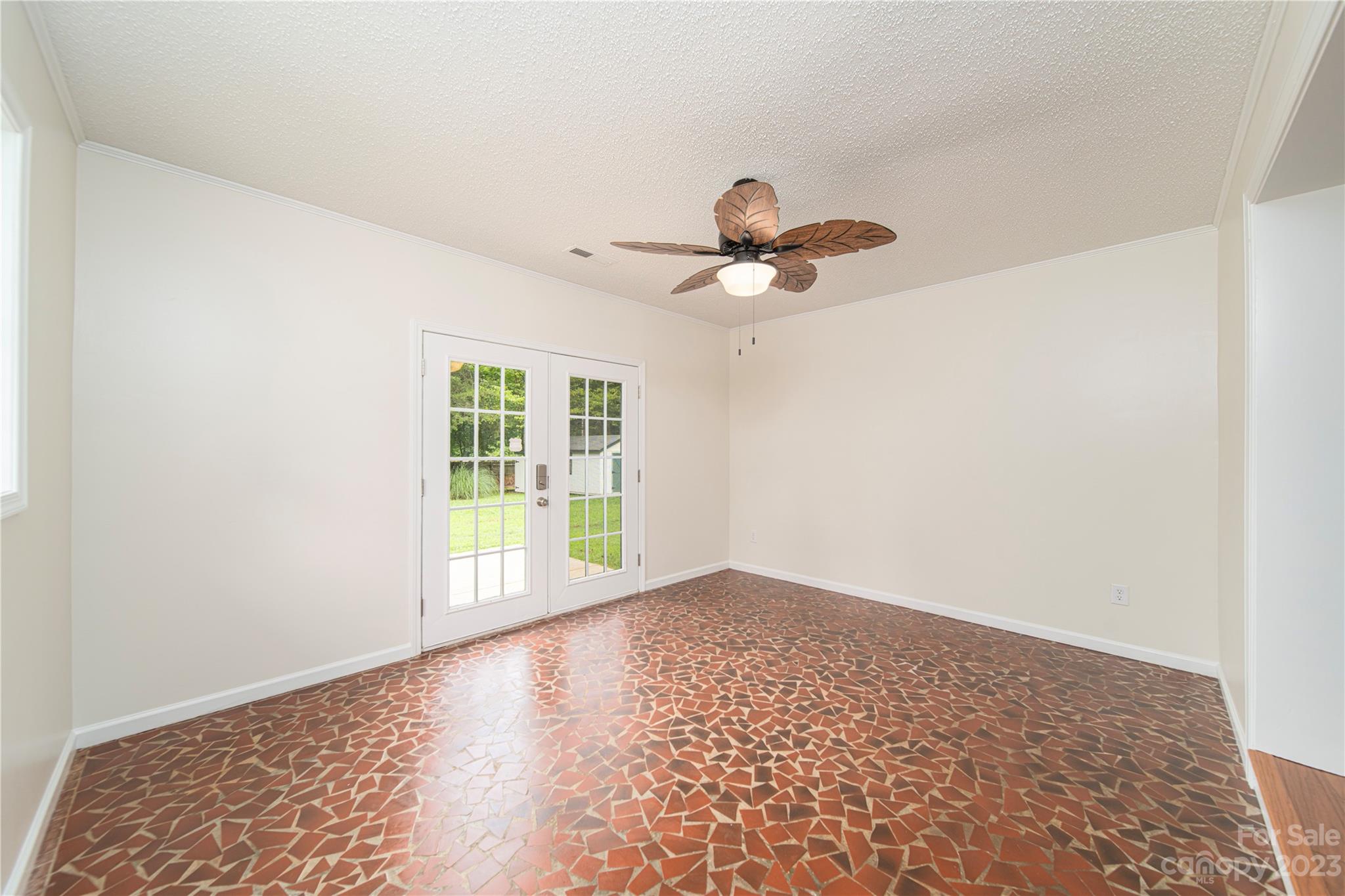 1253 Rainbow Road Advance, NC 27006 - Photo 27 of 46 a view of an empty room with a window