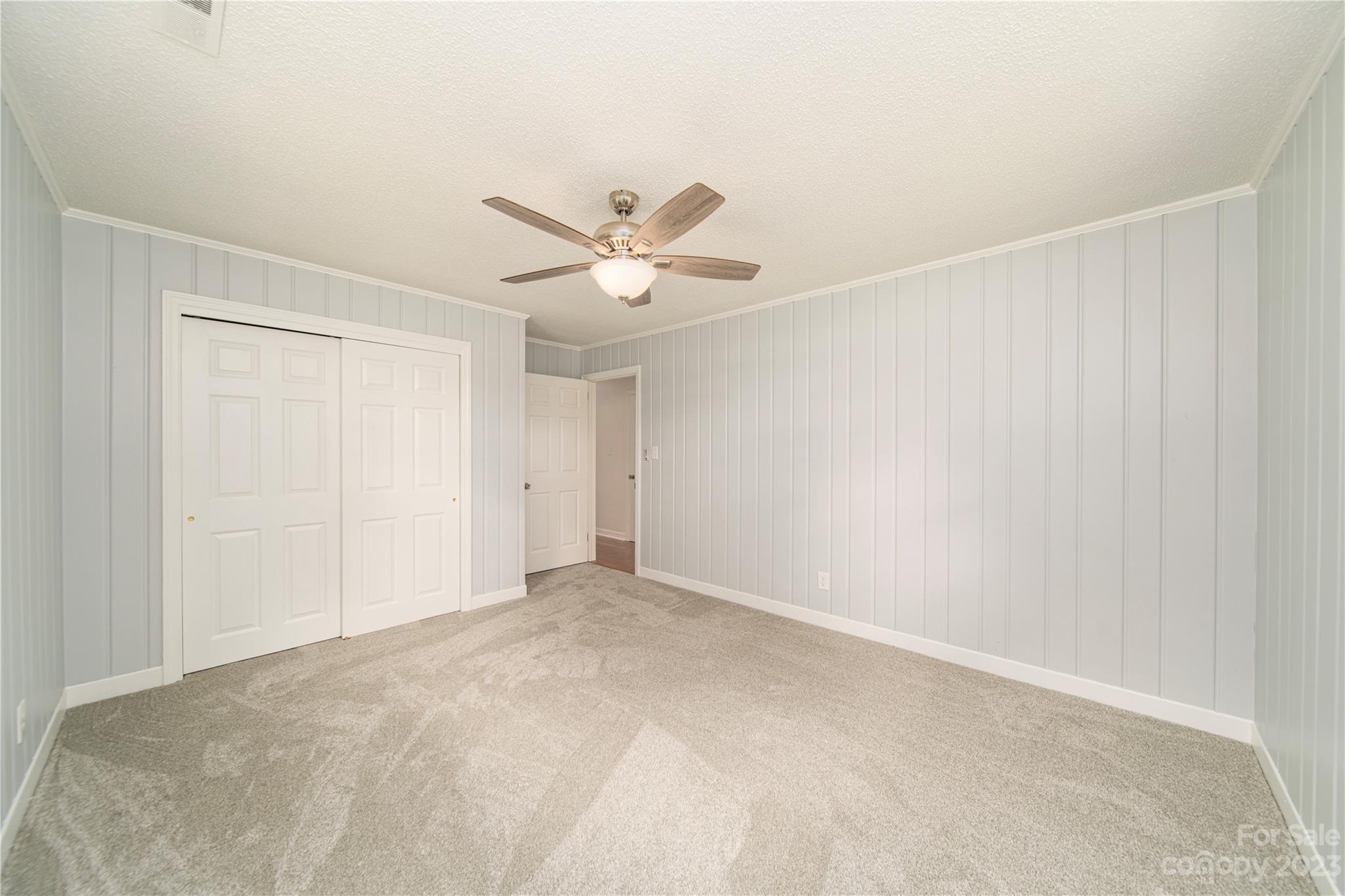 1253 Rainbow Road Advance, NC 27006 - Photo 36 of 46 a view of a big room with carpet