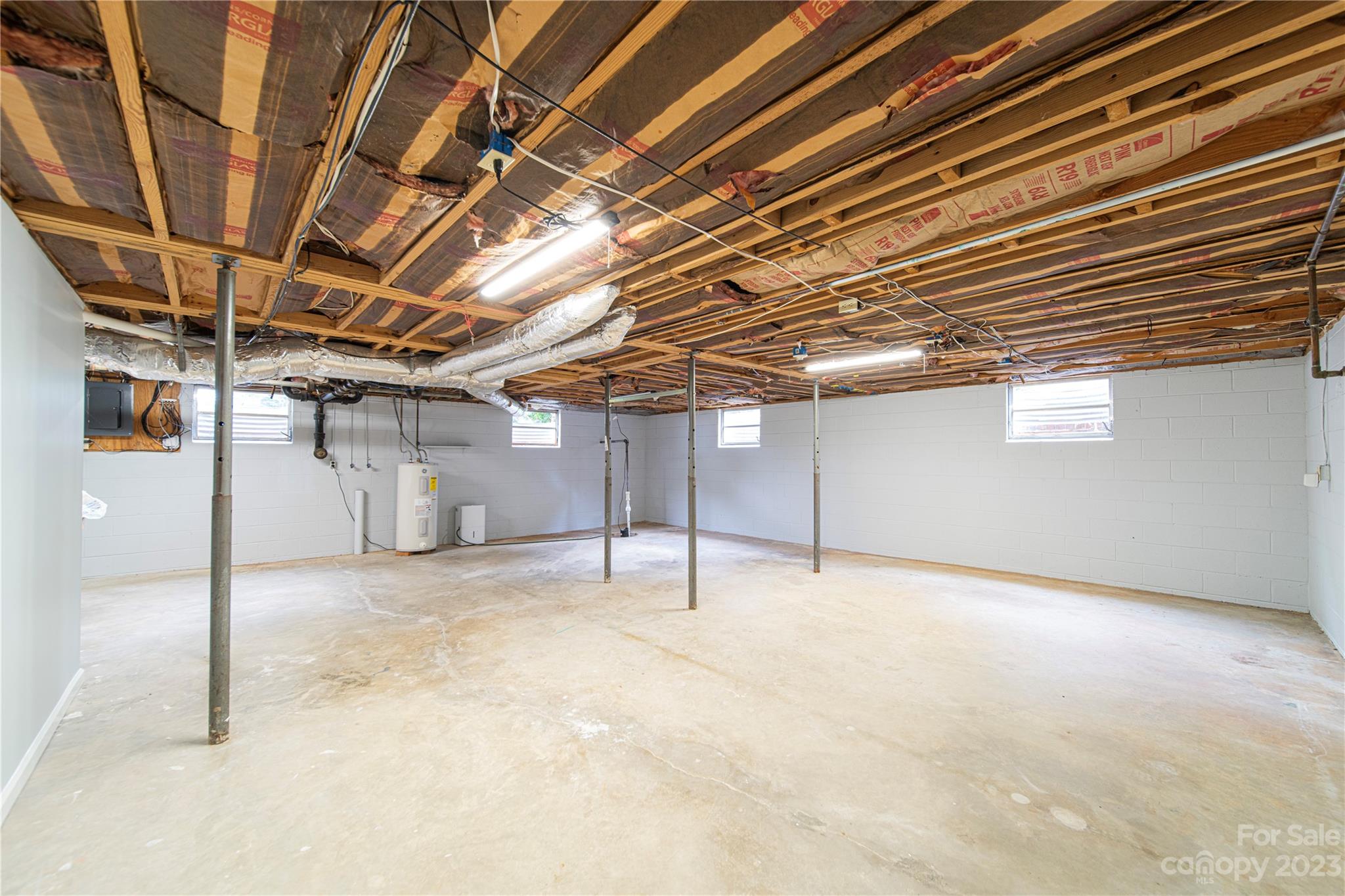 1253 Rainbow Road Advance, NC 27006 - Photo 39 of 46 a view of empty room with wooden ceiling
