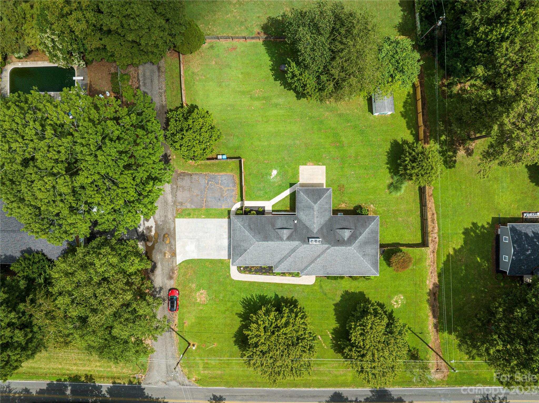 1253 Rainbow Road Advance, NC 27006 - Photo 6 of 46 an aerial view of a house with a yard