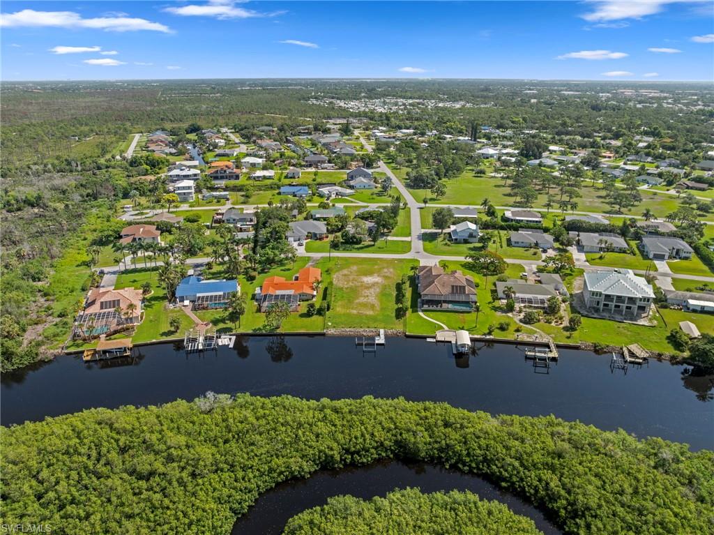 4947 Riverside Drive Estero, FL 33928 - Photo 13 of 16 an aerial view of multiple house