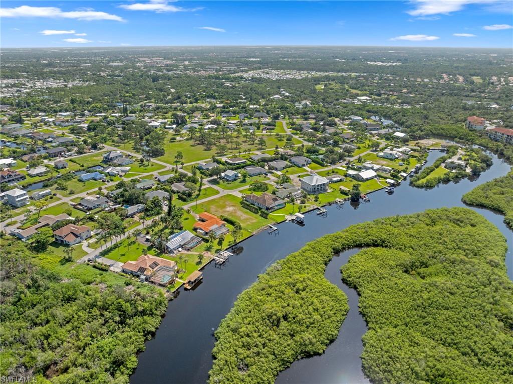 4947 Riverside Drive Estero, FL 33928 - Photo 15 of 16 an aerial view of residential houses with outdoor space