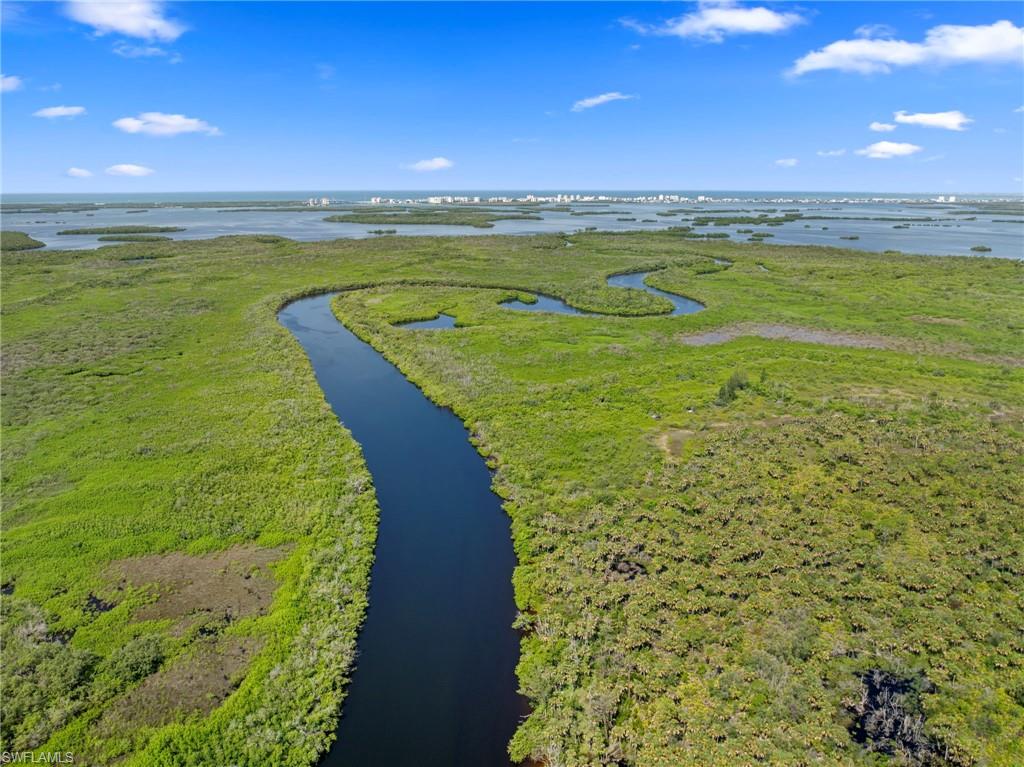 4947 Riverside Drive Estero, FL 33928 - Photo 16 of 16 a view of an ocean and beach