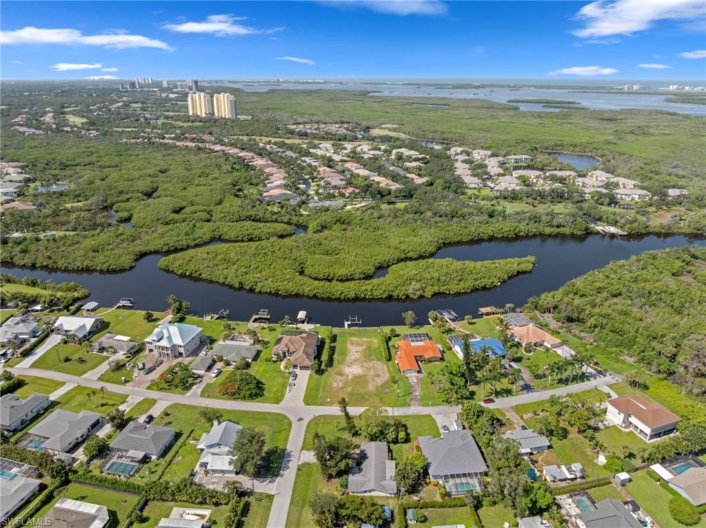 4947 Riverside Drive Estero, FL 33928 - Photo 6 of 16 a view of a city with an ocean