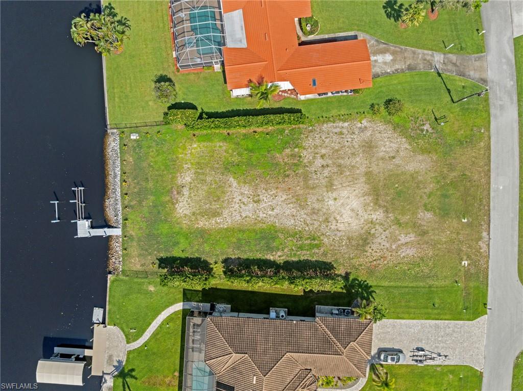 4947 Riverside Drive Estero, FL 33928 - Photo 8 of 16 an aerial view of a house having outdoor space