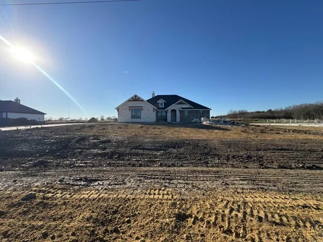 a view of a road with an ocean view