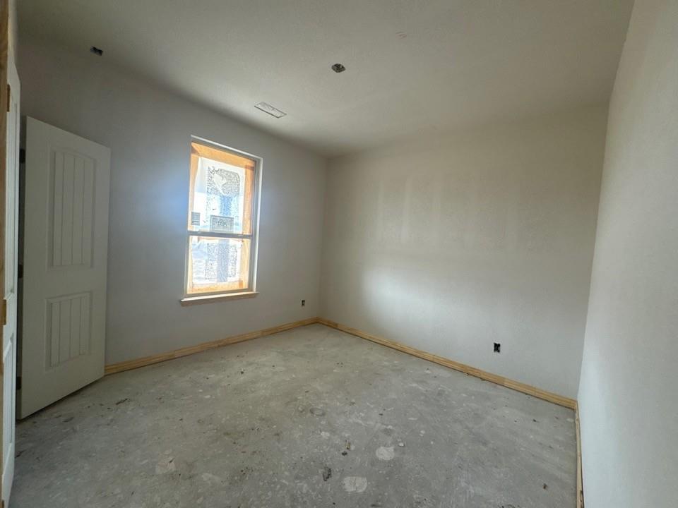 8911 County Road 623 Blue Ridge, TX 75424 - Photo 13 of 14 an empty room with a window