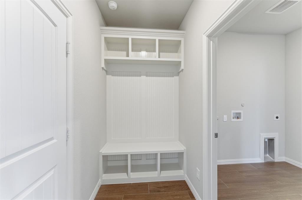 8911 County Road 623 Blue Ridge, TX 75424 - Photo 17 of 28 Mudroom with wood finish floors and baseboards