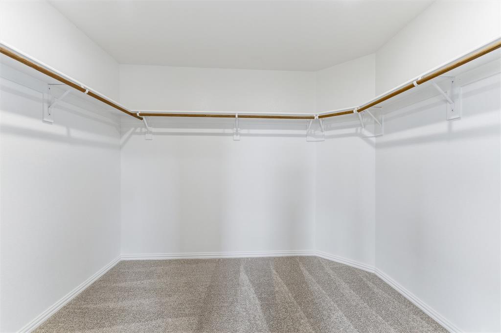 8911 County Road 623 Blue Ridge, TX 75424 - Photo 22 of 28 Walk in closet featuring carpet floors