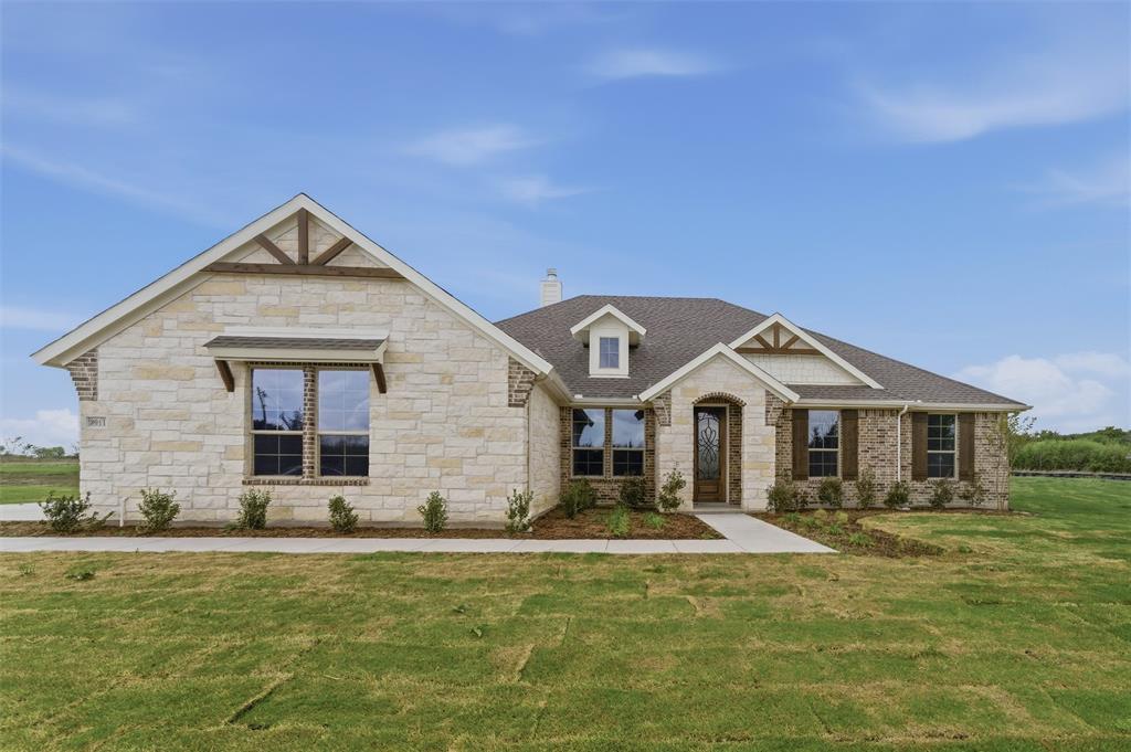 8911 County Road 623 Blue Ridge, TX 75424 - Photo 3 of 28 Craftsman house featuring a front yard, stone siding, a chimney, and roof with shingles