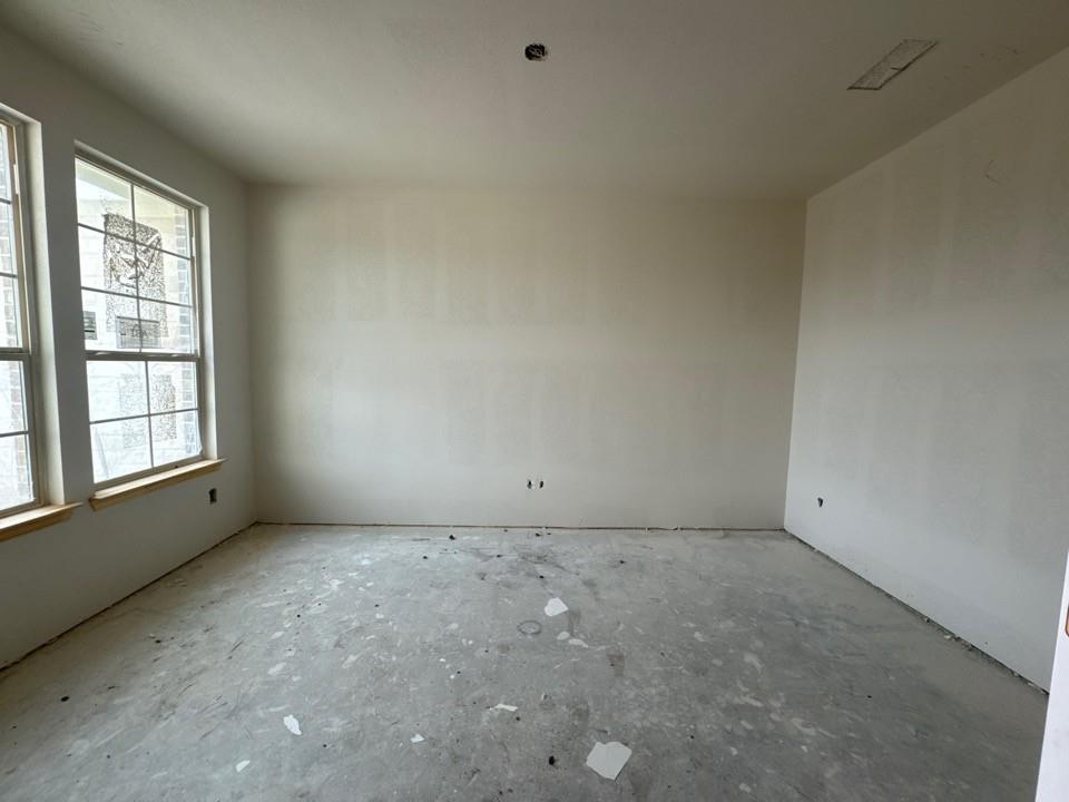 8911 County Road 623 Blue Ridge, TX 75424 - Photo 4 of 14 a view of an empty room with a window