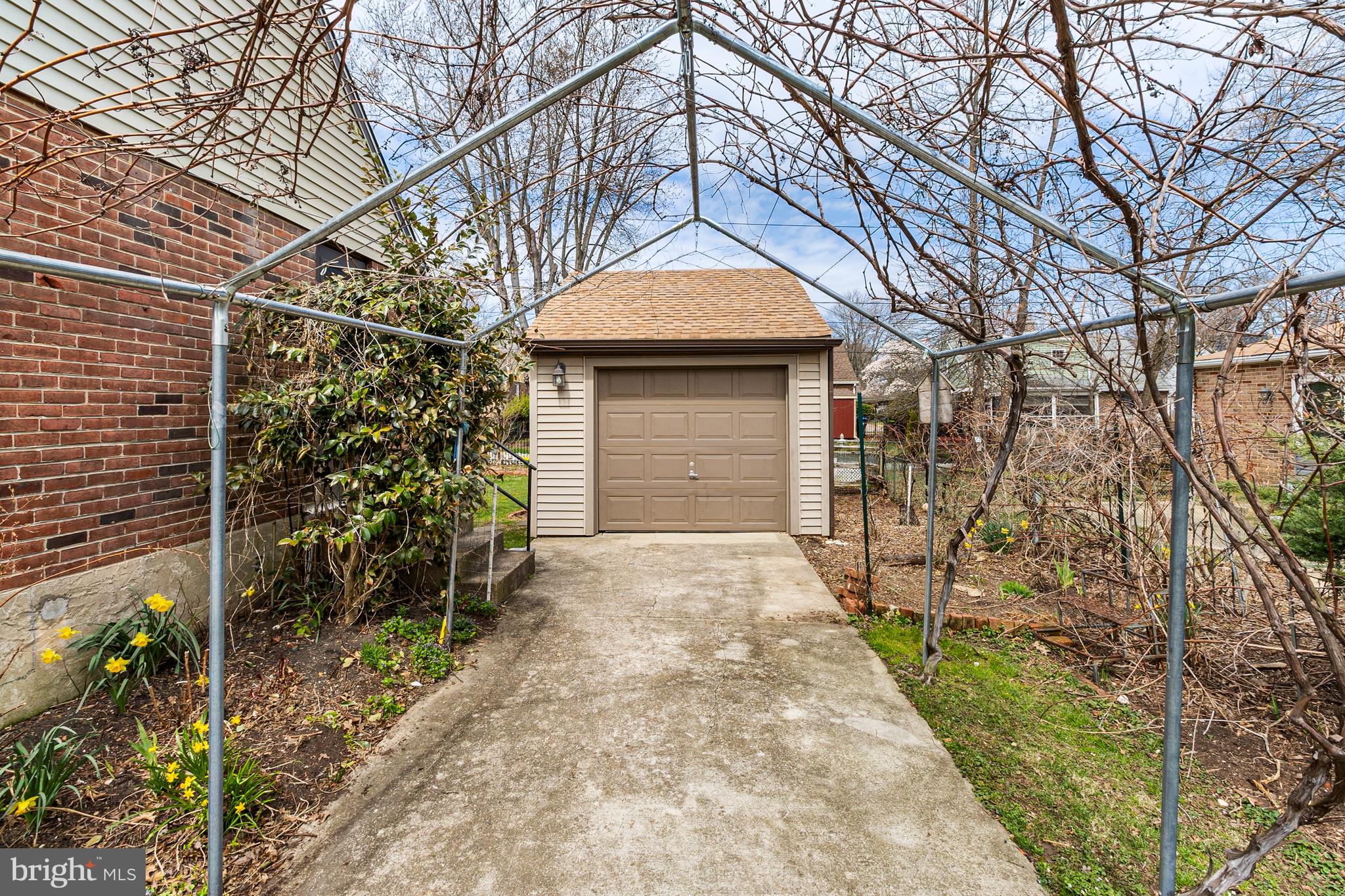 107 Devonshire Road Wilmington, DE 19803 - Photo 4 of 30 Beautiful Grape Trellis Leads To Garage