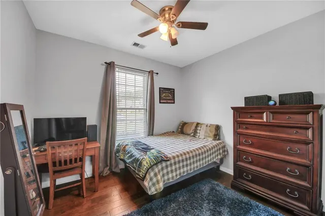 a bedroom with a bed and furniture