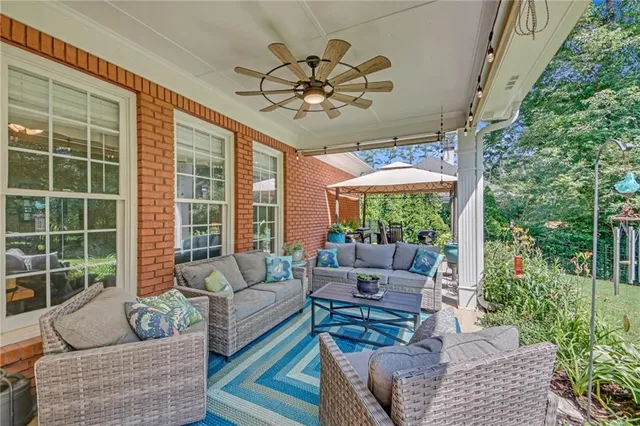 a outdoor living space with furniture and garden view