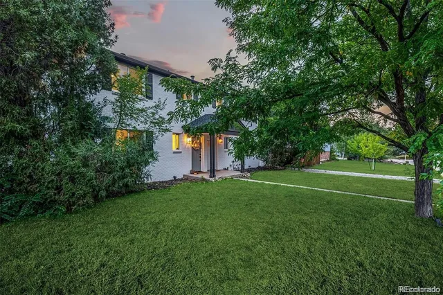an aerial view of a house with a garden